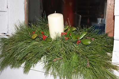 Greenery with candle